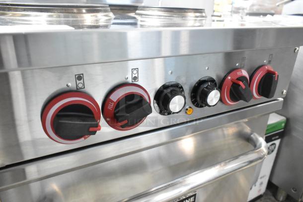 2023 Cookline ER24-208 stainless steel electric 4-burner range with oven, over shelf, and backsplash. 208V, 1-phase.