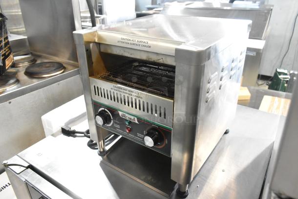 Winco Spectrum ECT-300 stainless steel conveyor toaster oven, 120V, 1 phase. Features control knobs, "Caution: Hot Surface" label.