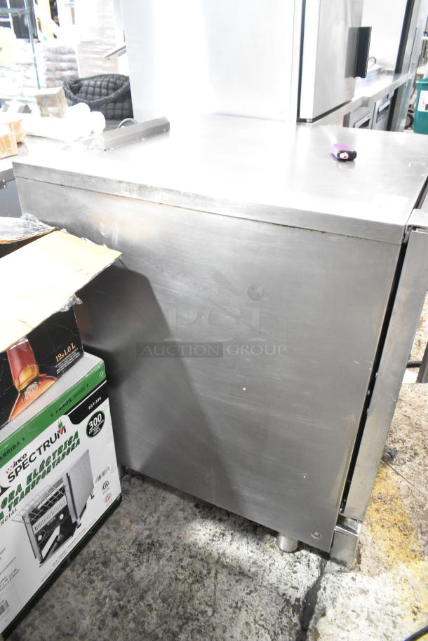 Moffat Turbofan stainless steel convection oven, electric-powered, with viewing door and metal racks, in used condition.