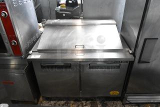 Maxx Cold MXCR48MHC stainless steel sandwich salad prep table, mega top, on commercial casters, 115V, 1 phase.