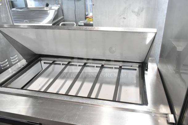 Maxx Cold MXCR48MHC stainless steel prep table; mega top bain marie; on commercial casters; 115 volts, 1 phase.