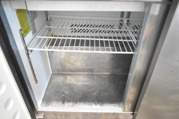 Maxx Cold MXCR48MHC stainless steel salad prep table interior with wire shelf, showing light wear. 115V, 1 Phase.
