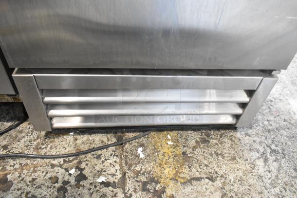True T-19F stainless steel commercial reach-in freezer, single door, 115 volts, visible lower vent panel.