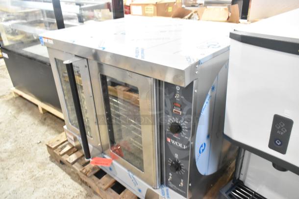 BRAND NEW Wolf WC4GD-21D3 stainless steel propane convection oven with view doors, metal racks, and thermostatic controls.