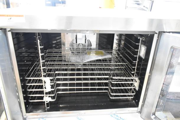 Brand new Wolf WC4GD-21D3 stainless steel propane convection oven, view-through doors, metal racks, thermostatic controls, 50,000 BTU.