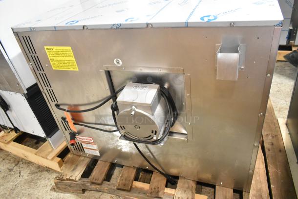 BRAND NEW Wolf WC4GD-21D3 stainless steel commercial convection oven. Single deck, 50,000 BTU, liquid propane. Unused, has minor scratches and dents. View-through doors, metal racks, thermostatic controls visible.