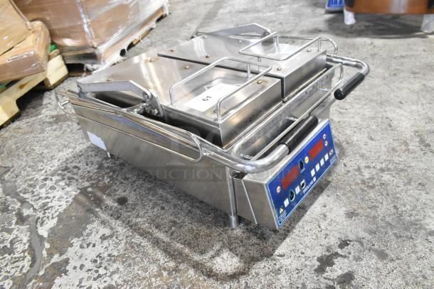 Proluxe stainless steel commercial countertop panini press, 208 volts, 1 phase, excellent condition.