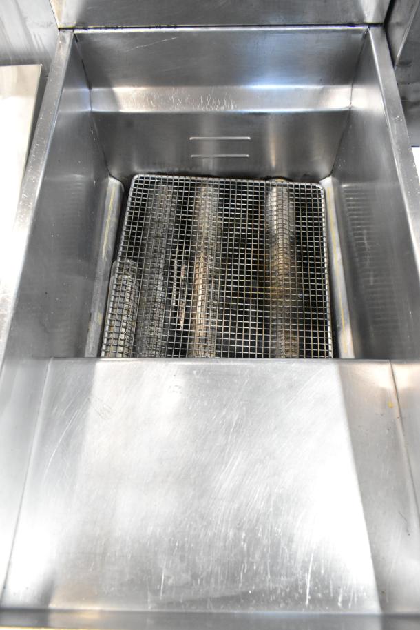 Asber stainless steel commercial deep fat fryer, floor style, with clean interior and grid rack, ideal for heavy-duty use.