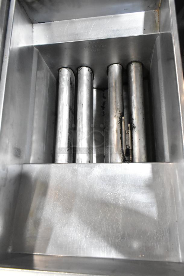 Pitco Frialator SG14 stainless steel commercial gas fryer, 110,000 BTU, interior view, floor style, used condition.