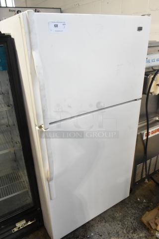 Maytag M1TXEGMYW01 refrigerator with freezer, white. 115 volts, 1 phase, visible wear, sticker with auction details.