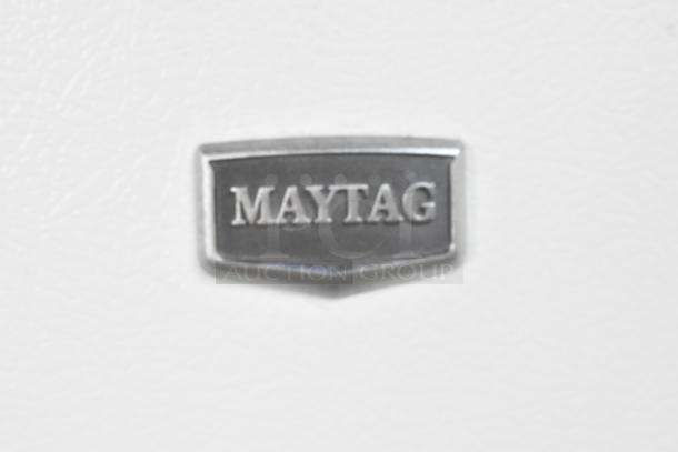 Maytag M1TXEGMYW01 cooler with freezer, 115 volts, 1 phase, features the Maytag logo badge on a white surface.