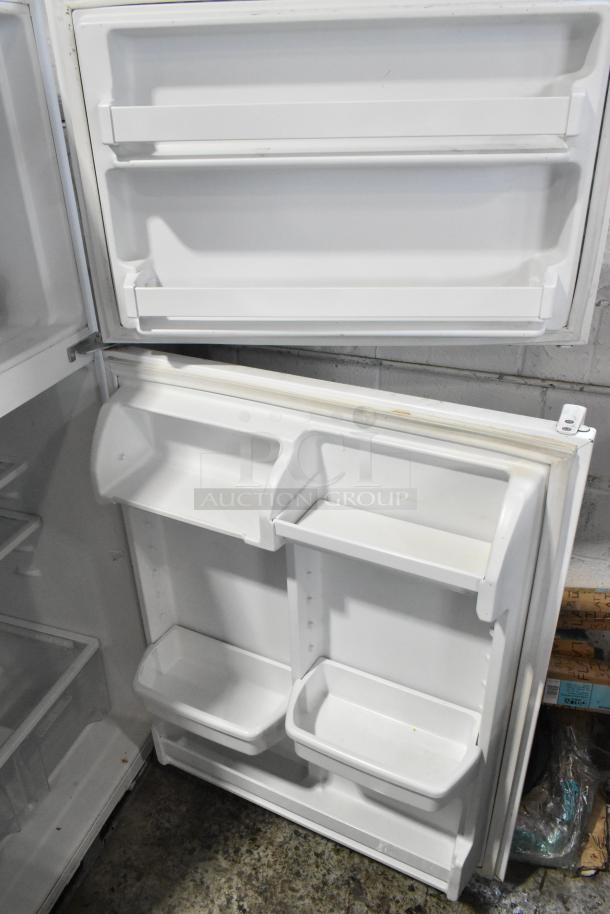 Maytag M1TXEGMYW01 cooler with freezer, 115 volts, 1 phase. White interior, door shelves, spacious storage. Clean condition.