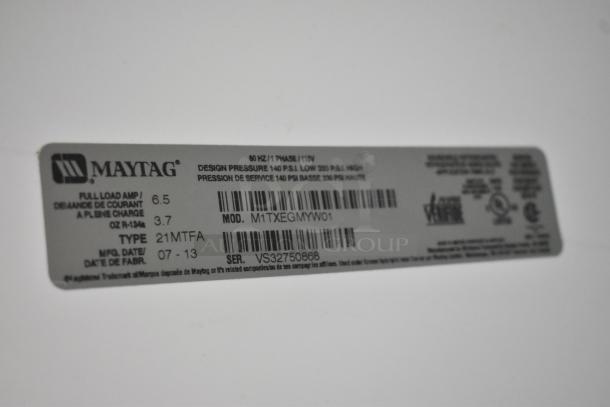 Maytag M1TXEGMYW01 cooler with freezer label, 115V, 1 phase, model and serial numbers visible.