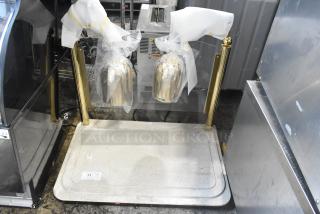 Hatco DCSB400-3624-2 commercial carving station with 2 heat lamps, 120V, 1 phase, metal base, gold-colored support, new condition.