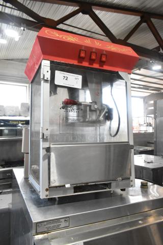 Great Northern 6128 metal commercial countertop popcorn machine, red top, branding visible, 120V, 1-phase, good condition.