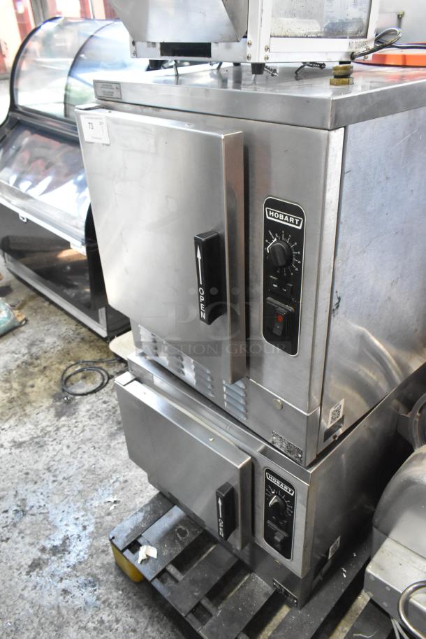 2 Hobart HC24EA3 stainless steel steam cabinets, electric-powered, single deck, 208/240 volts, used condition.