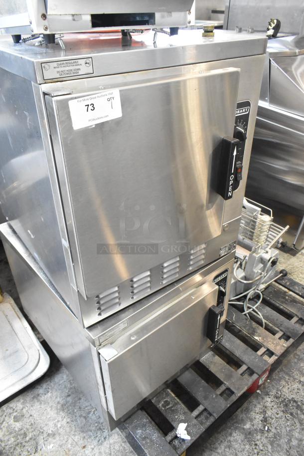 Hobart HC24EA3 stainless steel steam cabinets, electric, single deck, 208/240V, dual units. Clean, minor wear visible.