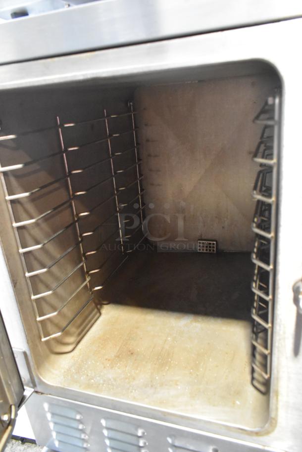 2017 Hobart HC24EA3 stainless steel steam cabinet interior, single deck, electric, 208/240V, good condition.