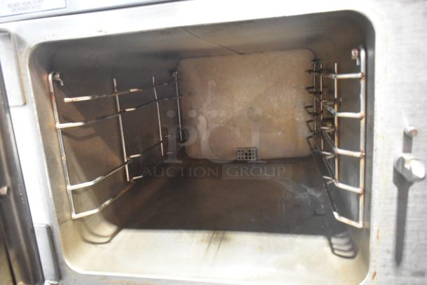 Hobart HC24EA3 stainless steel steam cabinet interior, commercial grade, electric powered, single deck, 208/240V, 3/1 phase.
