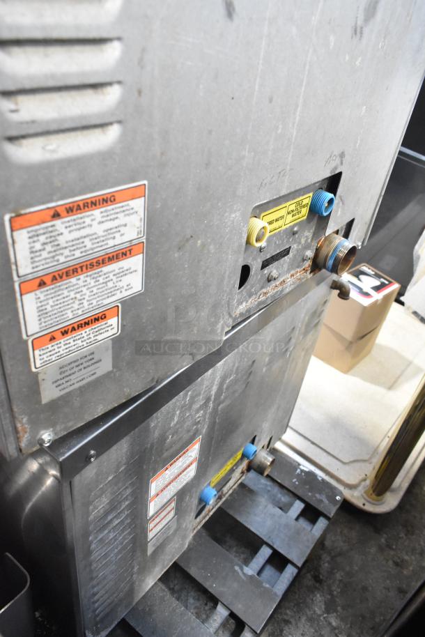 Hobart HC24EA3 stainless steel steam cabinet, single deck, electric powered, 208/240V, 3/1 Phase, visible warning labels.