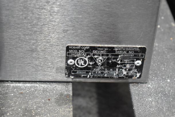 Hobart HC24EA3 stainless steel steam cabinet label, showing model, serial number, UL certification, and power details.