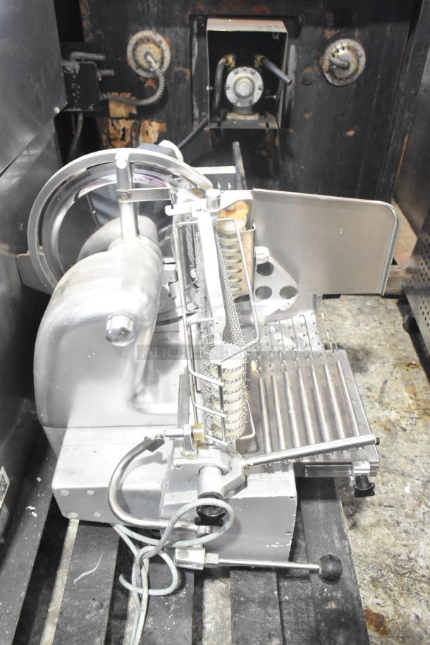 Bizerba A330 stainless steel commercial countertop meat slicer stacker. Features include 115 volts, 1 phase. Good condition.