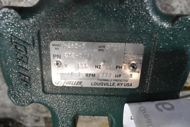Zoeller M2B2-D metal pump, 115V, 1 phase. Plate shows model, serial numbers, and specs. Thermally protected.