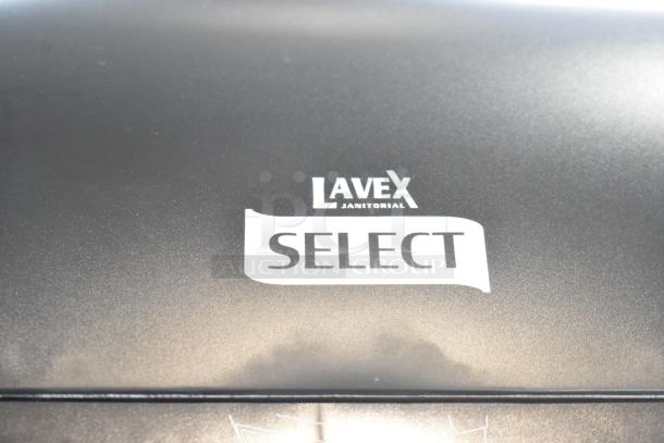 Lavex Select black poly wall mount paper towel dispenser, brand logo visible, sleek design, ideal for commercial use.