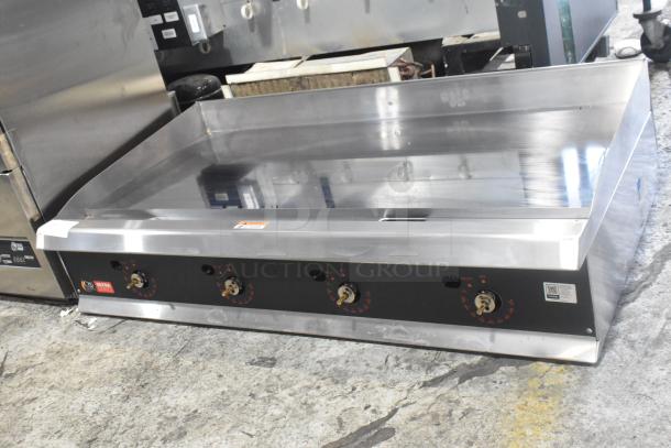 BRAND NEW Commercial Countertop Propane Griddle by Cooking Performance Group, model 351GTUCPG48L, stainless steel, 120,000 BTU.