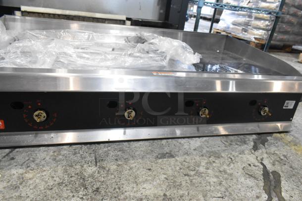 Brand new Cooking Performance Group 351GTUCPG48L stainless steel propane gas griddle, chrome top, 120,000 BTU.