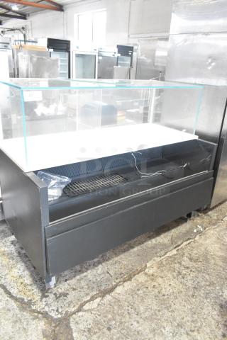 Metal commercial horizontal open merchandiser with top display case, black finish, minor wear, label number 82.