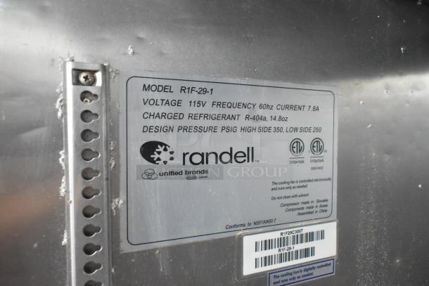 Randell R1F-29-1 stainless steel reach-in freezer label, 115V, 1 Phase, charged with R-404a refrigerant, on commercial casters.