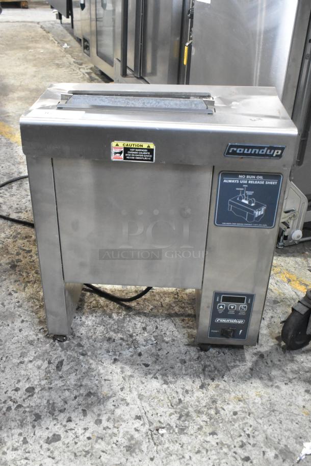 Roundup AJ Antunes VCT-2000CS stainless steel commercial countertop vertical contact toaster, 208 volts, with caution label.