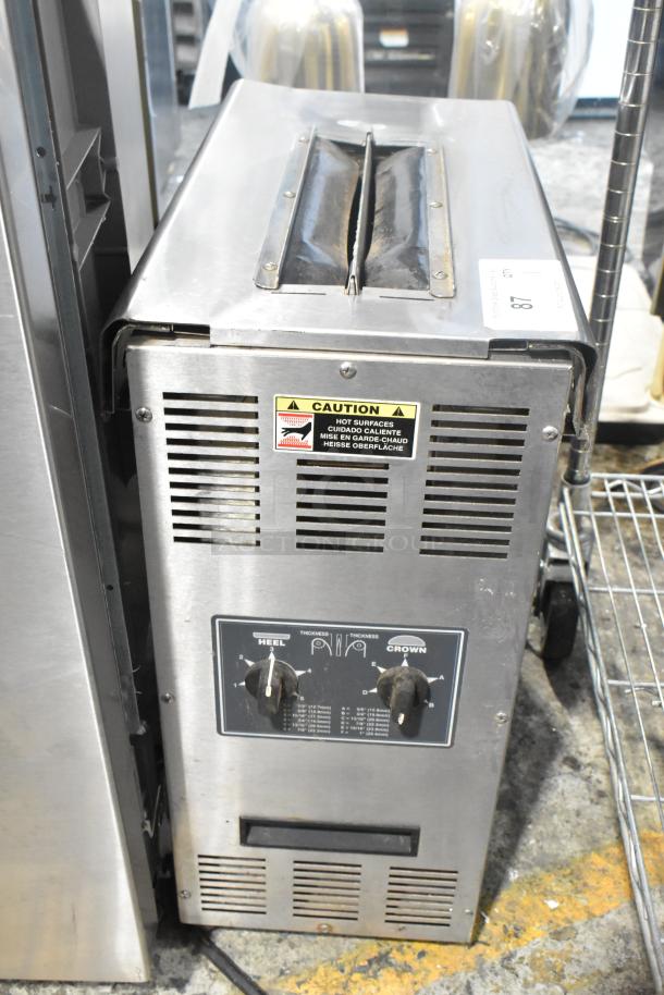 Roundup VCT-2000CS Stainless Steel Vertical Contact Toaster, 208 Volts, with operational dials and caution labels.
