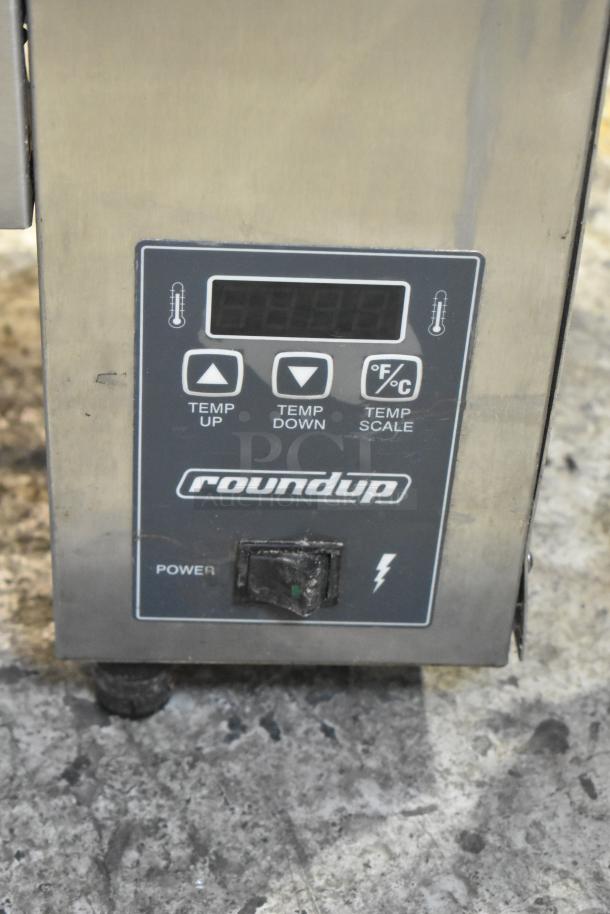 Roundup AJ Antunes VCT-2000CS stainless steel vertical contact toaster with digital controls and power switch, 208 volts.