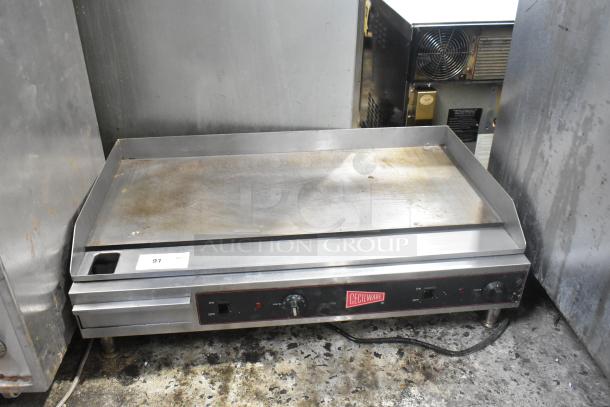 2016 Cecilware EL-1636 stainless steel commercial countertop griddle. 240V, 1 Phase, visible wear, red logo, temperature knob.
