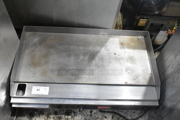 2016 Cecilware EL-1636 stainless steel commercial countertop griddle, 240V, 1 phase. Some surface wear, signage visible.