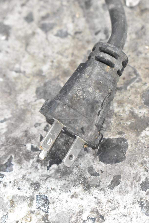 Close-up of the power plug for a 2016 Cecilware EL-1636 stainless steel griddle, 240 volts, 1 phase. Worn condition.