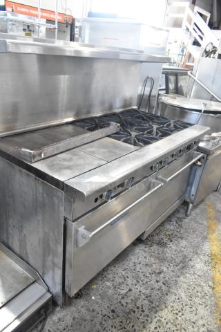 Imperial stainless steel commercial gas range with 6 burners, flat top griddle, convection oven, standard oven, overshelf, and backsplash.
