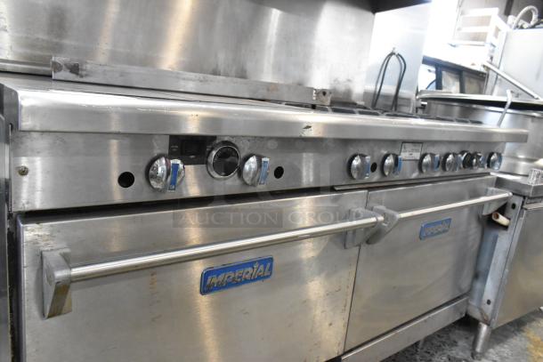 Imperial Stainless Steel 6 Burner Range, gas-powered, with flat top griddle, convection oven, standard oven, over shelf, backsplash.