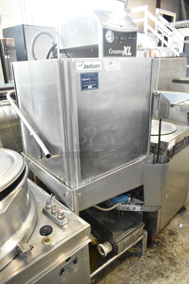 Jackson Conserver XL stainless steel commercial dishwasher, pass-through model. Features front panel controls and TempChek label.