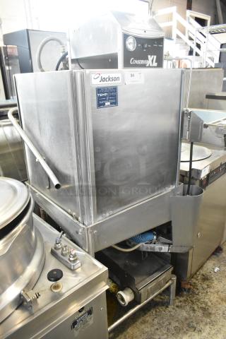 Jackson Conserver XL stainless steel commercial dishwasher, pass-through model. Features front panel controls and TempChek label.