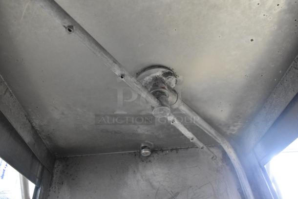 Jackson Conserver XL commercial pass-through dishwasher interior. Stainless steel, 115V, 1 phase. Good condition.