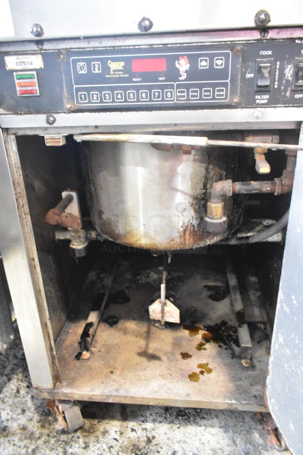 Chester Fried CF 600 stainless steel commercial electric deep fat fryer, 208 volts, 3 phase, on casters, showing usage wear.