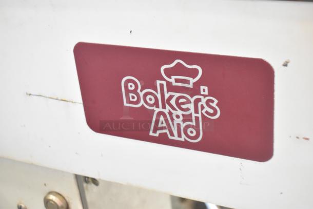Bakers Aid BA 630F commercial dough mixer, 30-quart capacity. Burgundy logo on white body, 120 volts, 1 phase.