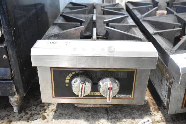 Toastmaster TMDO-12 stainless steel 2-burner propane range, commercial countertop, visible knobs, light wear.