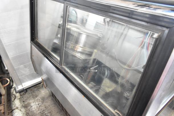 Structural Concepts RDG4848R refrigerated display case, metal finish, floor style, commercial use, 120V, 1 phase.