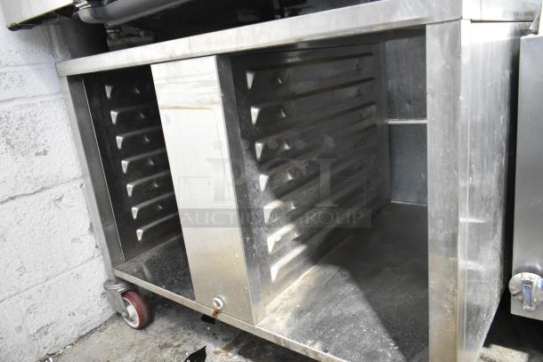 Rational SelfCooking Center stainless steel combi convection oven on a double pan rack stand with commercial casters.