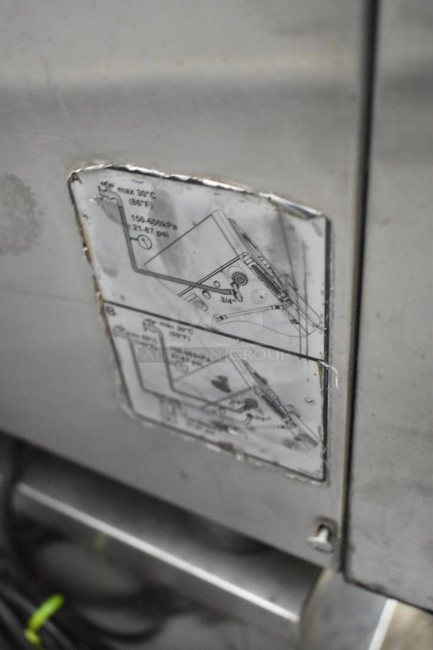 Rational SelfCooking Center combi convection oven on double pan rack with commercial casters, stainless steel, visible diagram label.