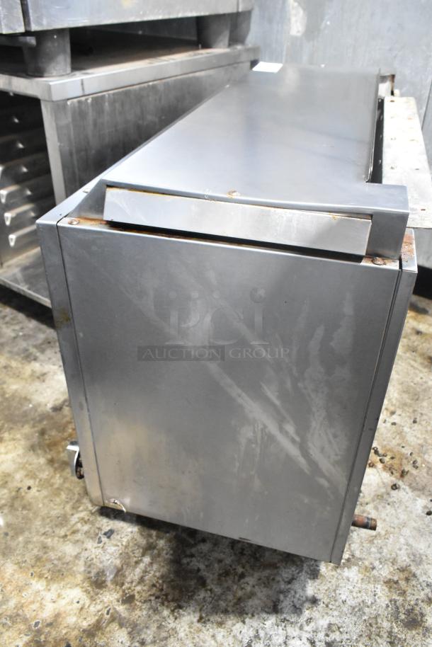 Southbend Stainless Steel Commercial Cheese Melter, showing wear with some rust and surface marks. Perfect for high-volume use.